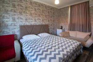 Letto o letti in una camera di Hotel Smile