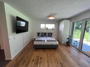Ένα ή περισσότερα κρεβάτια σε δωμάτιο στο PR Apartment