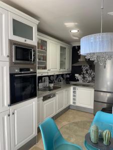 A kitchen or kitchenette at Selena Luxury Monte Carrera