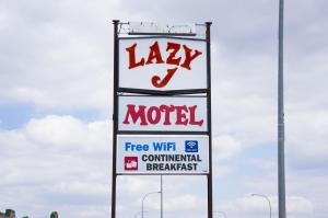 شهادة أو جائزة أو لوحة أو أي وثيقة أخرى معروضة في Lazy J Motel