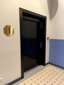 Postel nebo postele na pokoji v ubytování Studio in Noblessner