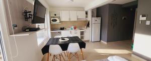 A kitchen or kitchenette at Departamento Austral II