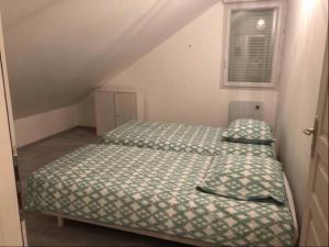 Katil atau katil-katil dalam bilik di Vue sur Mer