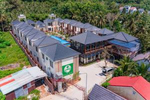 an aerial view of a resort with a pool at Palm Bay Resort Phu Quoc in Phú Quốc