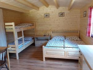 Postel nebo postele na pokoji v ubytování Autokemp / Speleocamp Malužiná