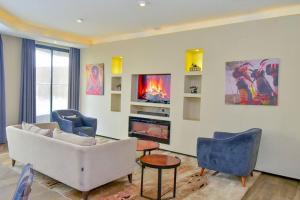 Χώρος καθιστικού στο Zuri Residence