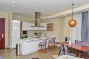 Η κουζίνα ή μικρή κουζίνα στο Zuri Residence