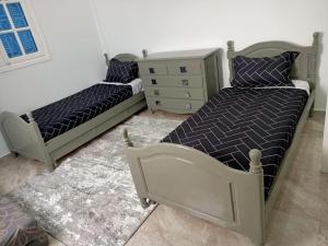 Кровать или кровати в номере VILLA SAM DJERBA LA DOUCE