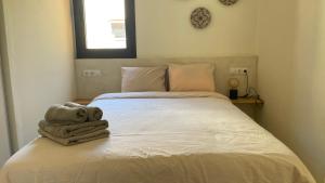 Ένα ή περισσότερα κρεβάτια σε δωμάτιο στο Dona Lola Resort Calahonda Mijas
