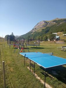 a row of trampoline courts in a field at Katun Mokra in Podgorica