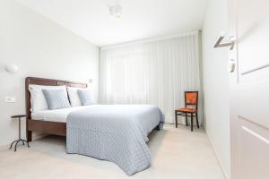 Кровать или кровати в номере Contrada del Nonno Apartments (city center - private parking on-site)