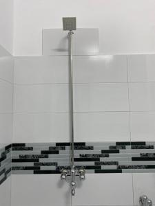 Ένα μπάνιο στο Taaj Residence Skardu