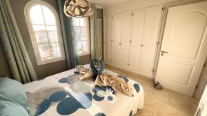 A bed or beds in a room at Selena Luxury Monte Carrera