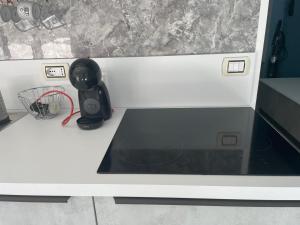 Kuchyň nebo kuchyňský kout v ubytování Appartamento a 20 metri dal mare.