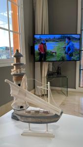 A television and/or entertainment centre at Selena Luxury Monte Carrera
