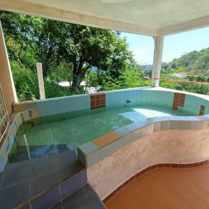 ein Pool in einem Haus in der Unterkunft Casa Blanca Zipolite, Dream House in Zipolite