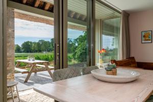 Balkón nebo terasa v ubytování Appartement de Dageraad in monumentale boerderij