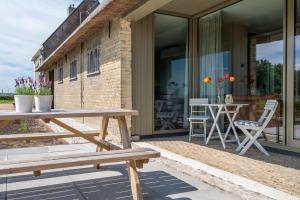 Balkón nebo terasa v ubytování Appartement de Dageraad in monumentale boerderij