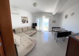 Posezení v ubytování Apartments Pisačić + 14 fotografií