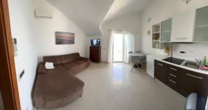 Kuchyň nebo kuchyňský kout v ubytování Apartments Pisačić