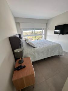 Giường trong phòng chung tại Torre Green Life FullAmenities