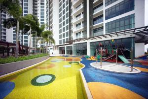 a playground in the middle of a building at ABHOME "ART MUSEUM SUITE" #GreenHaven #360"City & Sea View #Masai #JB in Johor Bahru