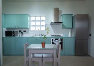 Una cocina o zona de cocina en SOHI Villa