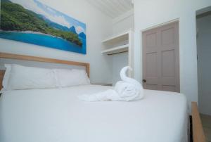 Cama o camas de una habitación en SOHI Villa