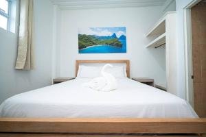 Cama o camas de una habitación en SOHI Villa