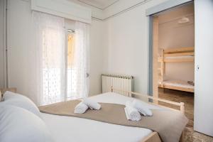 Ένα ή περισσότερα κρεβάτια σε δωμάτιο στο Argostoli Heart:A Perfect Escape