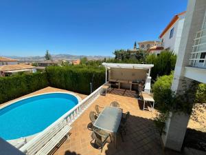 The swimming pool at or close to Villa Mare a los pies de Sierra Nevada