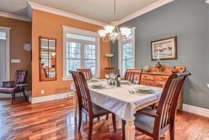 a dining room with a table and chairs at LaBelle View in Labelle