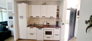 Kuchnia lub aneks kuchenny w obiekcie El Gueco Holiday Apartment