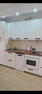 Kuchnia lub aneks kuchenny w obiekcie El Gueco Holiday Apartment