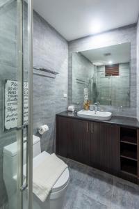 Koupelna v ubytování Kalipay Resort Siargao