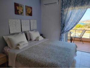Posteľ alebo postele v izbe v ubytovaní 180 Degree Sea View Apartment