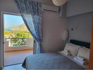 Posteľ alebo postele v izbe v ubytovaní 180 Degree Sea View Apartment