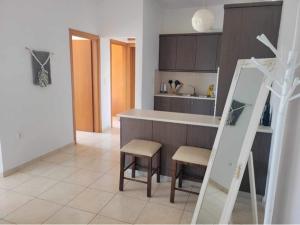 Kuchyňa alebo kuchynka v ubytovaní 180 Degree Sea View Apartment
