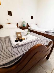 Postel nebo postele na pokoji v ubytování Zennova #22 Nikiti Sea Side House