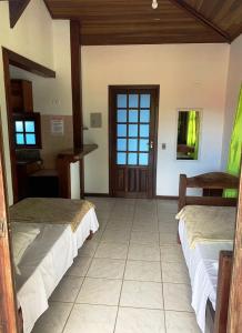 Postel nebo postele na pokoji v ubytování POUSADA BELLA SPIAGGIA