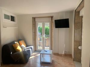 Μια τηλεόραση ή/και κέντρο ψυχαγωγίας στο A Casa de Meli +7 φωτογραφίες
