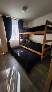 Ένα ή περισσότερα κρεβάτια σε δωμάτιο στο Condominio bosques del tabo,vista al mar