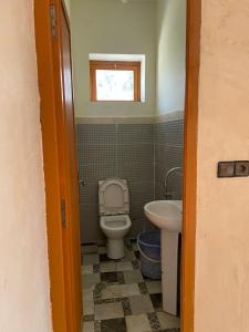 a bathroom with a toilet and a sink at Villa for daily rent فيلا للكراء اليومي in Marrakesh