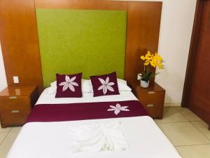 Letto o letti in una camera di Alec's Hotel