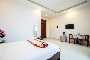 TV a/nebo společenská místnost v ubytování Tuấn An Hotel + 37 fotografií