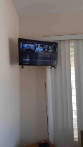 TV a/nebo společenská místnost v ubytování Casa Playa Tonsupa Tu paraíso frente al mar Internet Alta Velocidad Smart TV Netflix