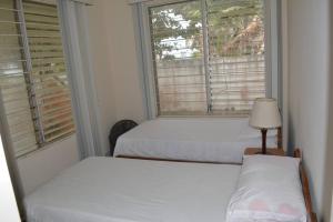 Postel nebo postele na pokoji v ubytování Casa Playa Tonsupa Tu paraíso frente al mar Internet Alta Velocidad Smart TV Netflix