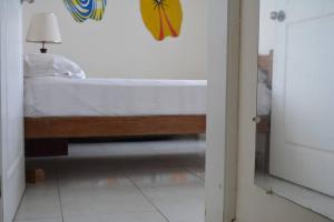 Postel nebo postele na pokoji v ubytování Casa Playa Tonsupa Tu paraíso frente al mar Internet Alta Velocidad Smart TV Netflix