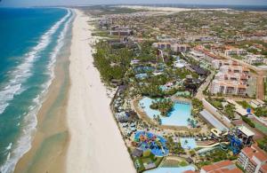 an aerial view of the resort and the beach at Flat Crystal Park Porto das Dunas in Aquiraz