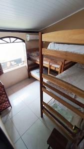 Krevet ili kreveti na kat u jedinici u objektu Hostel Alto Astral - Fonte